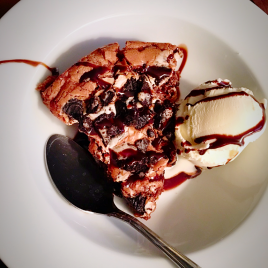 Oreo Brownie served W/ ice cream & chocolate drizzle